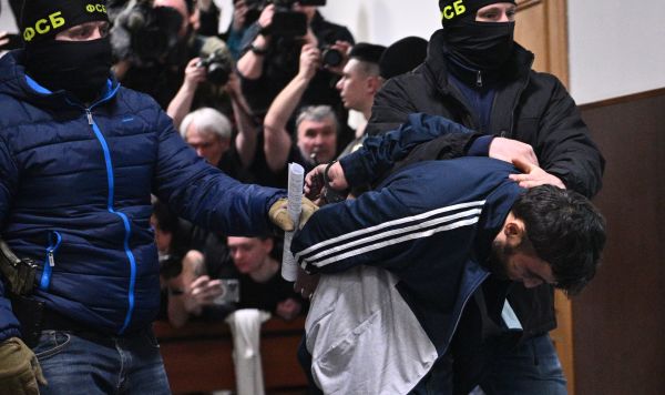 Далержон Мирзоев, задержанный по подозрению в террористическом акте в "Крокус Сити Холл", в здании Басманного суда Москвы, 24 марта 2024